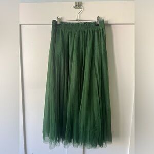 Gorgeous deep green chiffon skirt. Fully lined. Has an elastic waistband.